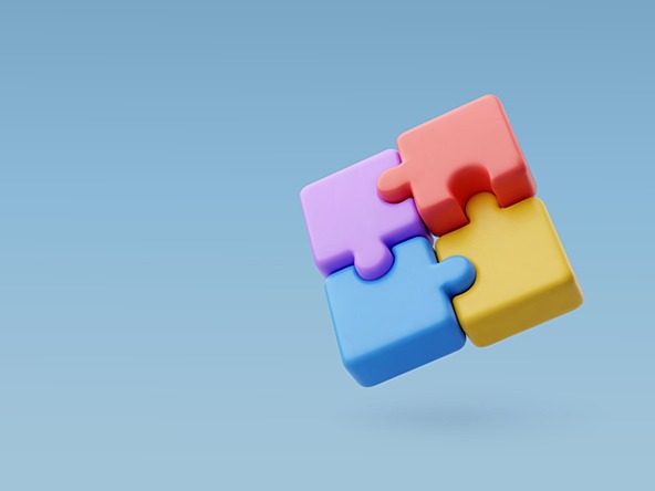 four interlocking colourful jigsaw puzzle pieces